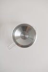 KINTO Cast glass teapot with stainless steel lid over view.