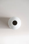 Ceramic peel-carved vase handmade in Canada and finished in a satin white glaze, top view of opening.