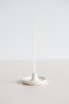 Pearl beeswax gala candle in a ceramic handmade candle holder.